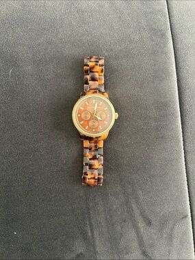 Michael Kors tortoise shell watch. Battery replacement required.